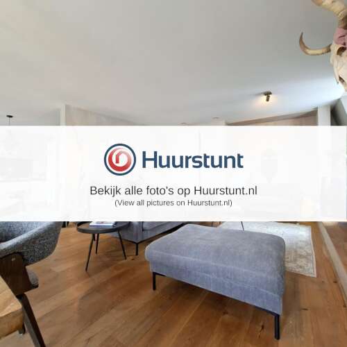 Woning aan de Damrak te Amsterdam